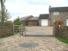 Buff sandstone cap on a gate pier