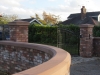 Sandstone pier cap on a brick pillar