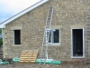 Sandstone lintel over a window opening
