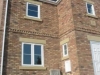 Red sandstone door lintel