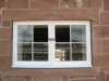 Weathered sandstone window sill