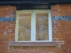 Red sandstone door lintel