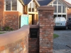Buff sandstone copings finishing the top of a wall