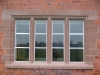 Hand-carved sandstone detail matched to an original