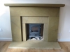 Hand-carved sandstone fireplace surround