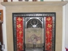 Red sandstone fireplace surround