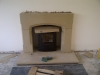 Sandstone fire surround with a chamfered jamb