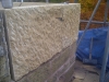 Batted hand-tooled sandstone surface