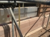 Chamfered sandstone plinth course
