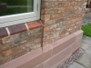 Weathered sandstone plinth detail
