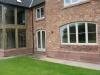 Sandstone plinth course with a moulded top