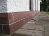 Sandstone plinth course being cut in the workshop