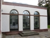 Splayed sandstone plinth course