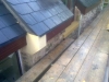 Carved sandstone corbel supporting a beam