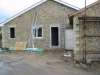 Red sandstone quoins on a property corner