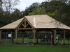 Red sandstone staddle stone with a hand-tooled finish