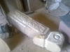 Shaping a sandstone gatepost in the workshop