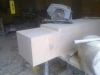 Hand-working a sandstone gatepost
