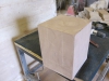 Carving a sandstone ball finial in the workshop