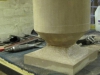 Smoothing a sandstone ball finial
