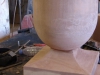 Carving a sandstone ball finial in the workshop
