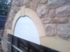 Arched sandstone door surround
