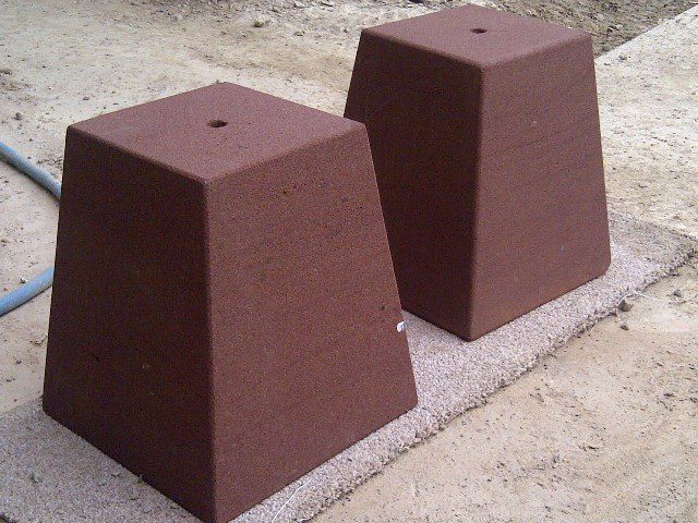 Red sandstone tapered staddle stone for a distinctive oak post base